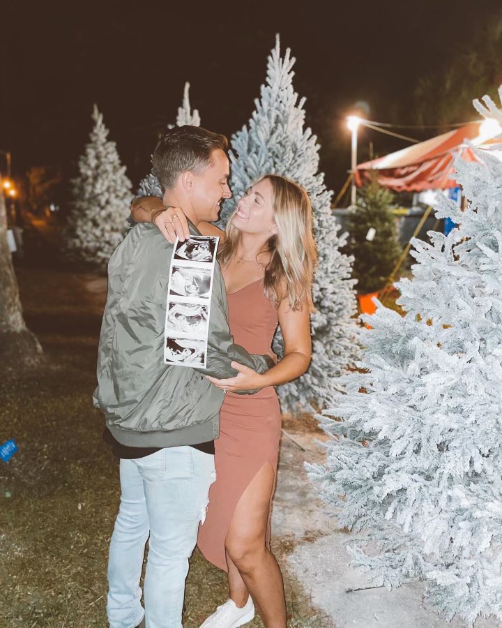 KadinKerns's tweet photo. We’ve been hiding more than presents this year ❤️Baby Kerns coming June 2022! https://t.co/4zR3b5PFJ2