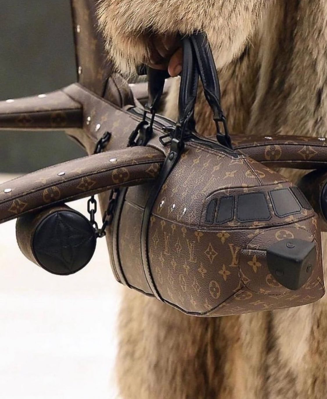 REVOLT on X: Louis Vuitton airplane shaped bag cost $39,000 &