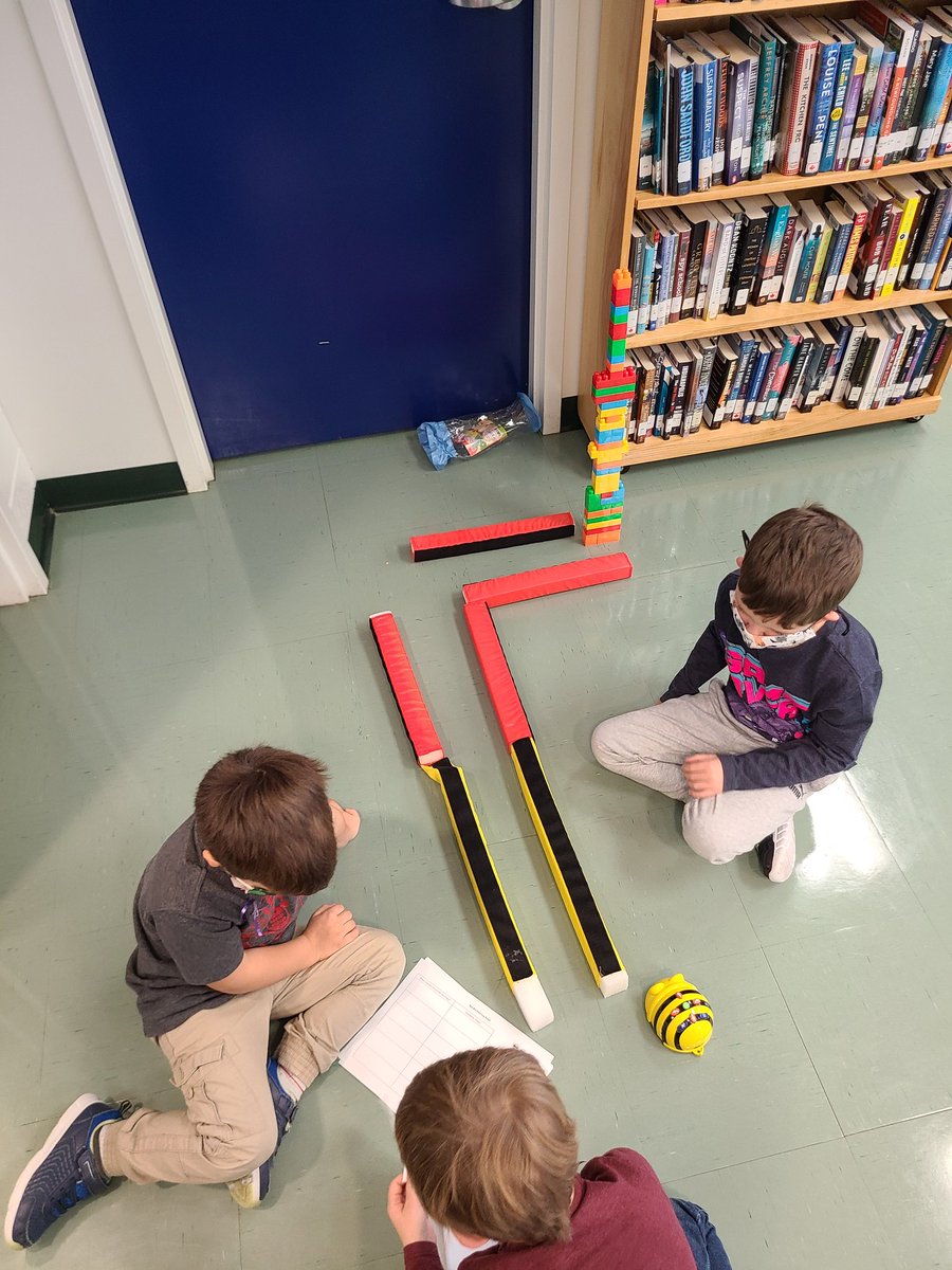 PaulHare16's tweet photo. The K/1 class at Burgeo Academy kicked off coding week planning their code and trying to reach their towers with the beebots @NLESDCA @nltatesic #codewithTESIC #codeNLESD https://t.co/amVZqEiiSY