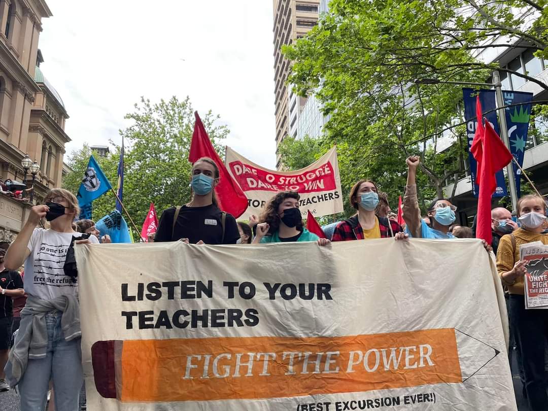 CarfSyd's tweet photo. Solidarity with striking teachers today! After 10 years, teachers are taking the sort of action which gets the goods! Along with bus and train drivers, teachers are refusing to cop the public servant pay freeze! They’re demanding #MoreThanThanks and we stand in solidarity! https://t.co/KeldAlAV1n
