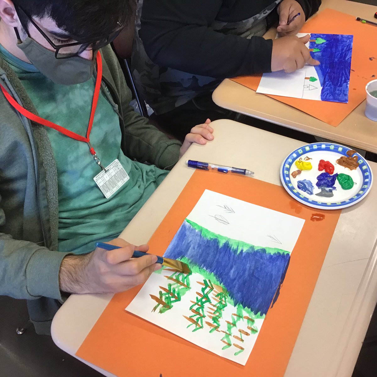 Amundsen_HS's tweet photo. Chicago based artist, John Otto Kuhlmann, did an art lesson in Ms. Close’s ESL class to help students increase their English vocabulary via colorful paintings. Today’s theme was winter scenes. @ChiPubSchools @amundsen_arts https://t.co/3VGev6Av09
