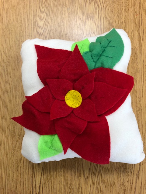 CholkasA's tweet photo. Some NRMS communicated holiday wishes in their sewing projects @WeAreNR @NRMiddleSchool https://t.co/Vb0KHIKA86