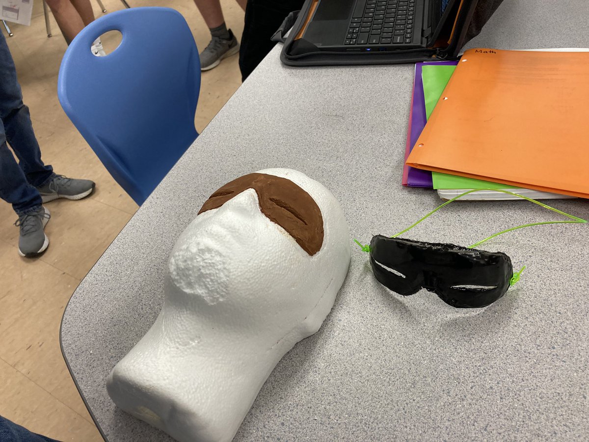 gsmsPS21's tweet photo. Learner successfully created a #vacuumFormed mask using a styrofoam head and air dry clay. This mask represents the earliest version of human sunglasses!! Before they used tinted material to see through, tiny slits were used to block out the sun! #ModernWork @ELANCOSD @Formech https://t.co/27FBR477BC