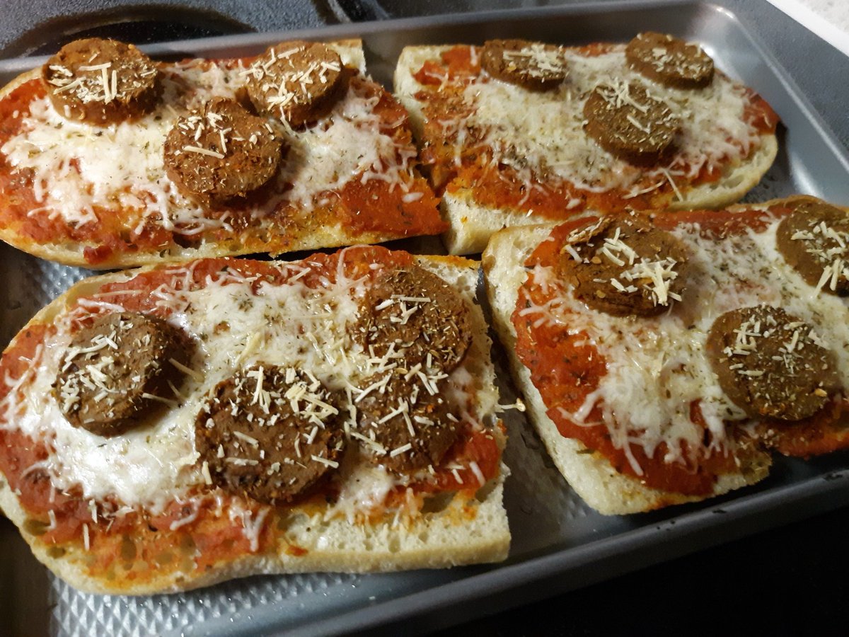 Zera77's tweet photo. Ordered the veggie roast beast from @VeryGoodButcher and it came with a sampler pack of sausages and a pepperoni stick so I decided to make a pizza for us tonight while we do our holiday cooking. Turned out pretty damn good! 🍕 #veggiecooking #homemadepizza https://t.co/FW4Sm0VwRF