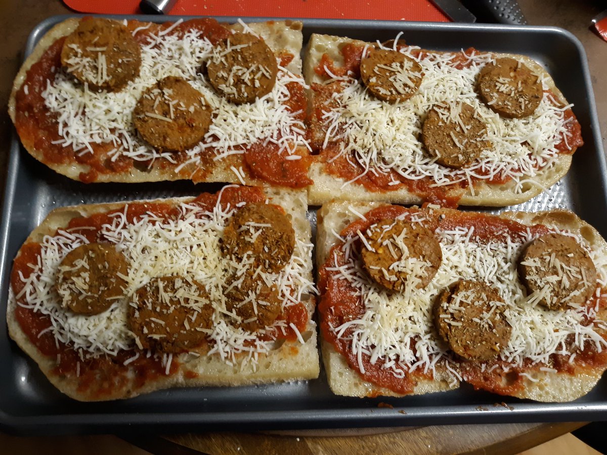 Zera77's tweet photo. Ordered the veggie roast beast from @VeryGoodButcher and it came with a sampler pack of sausages and a pepperoni stick so I decided to make a pizza for us tonight while we do our holiday cooking. Turned out pretty damn good! 🍕 #veggiecooking #homemadepizza https://t.co/FW4Sm0VwRF