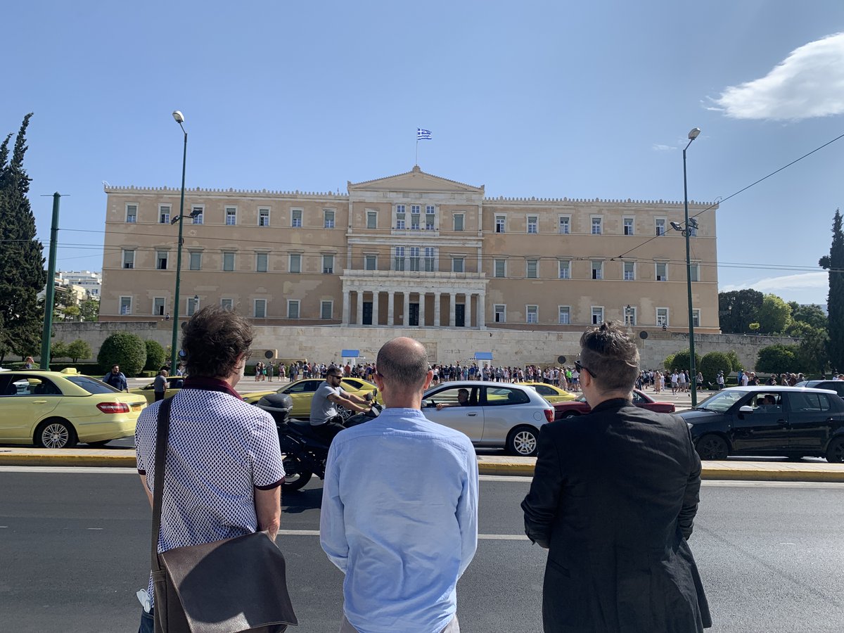 harari_yuval's tweet photo. Check out the three authors of ‘Sapiens: A Graphic History’ by a landmark that’s featured in ‘Volume 2 - The Pillars of Civilization’. 

Do you recognize the location, and can you spot the illustration they’re recreating from the book?

-YNH Team 
#GraphicSapiens https://t.co/h4BJ57jH00