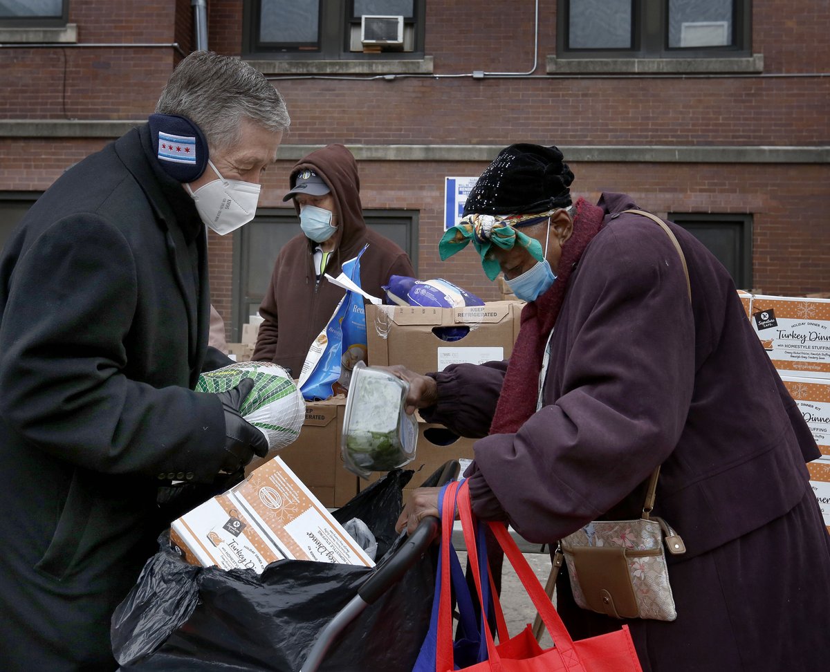 archchicago's tweet photo. .@CardinalBCupich helped distribute turkeys and winter clothing to families in need @stmosesparish food pantry on Nov. 24, 2021. The parish gave away 500 winter coats, hats, gloves and scarves in children and adult sizes.
(Photo credit: Karen Callaway/@ChicagoCatholic) https://t.co/aei9ciQwAa