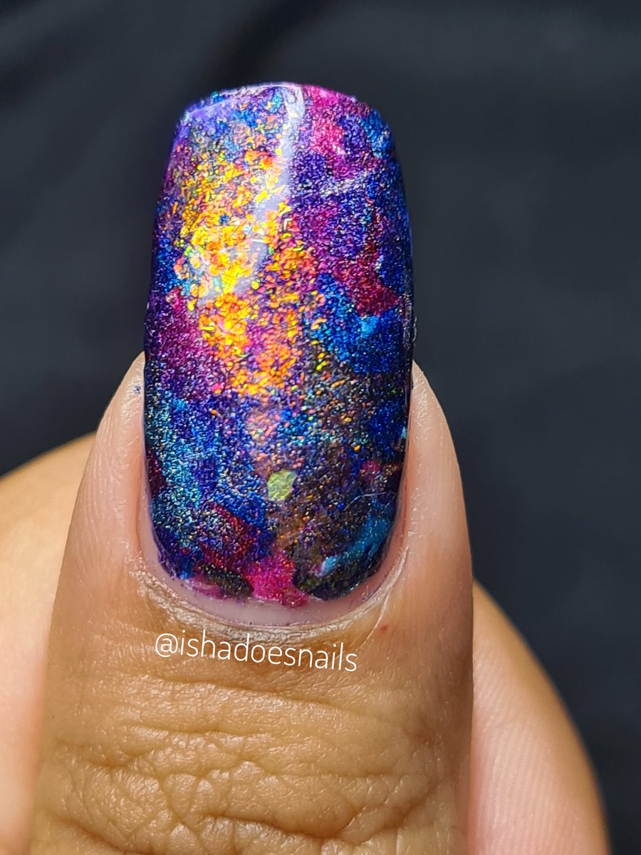ishadoesnails's tweet photo. A bunch of @holotaco liner holos, the smoosh technique and some unicorn skin makes for the best galaxy Mani 😍🌌@nailogical Can you list everything I used 😝 https://t.co/v0frzJ2hbq