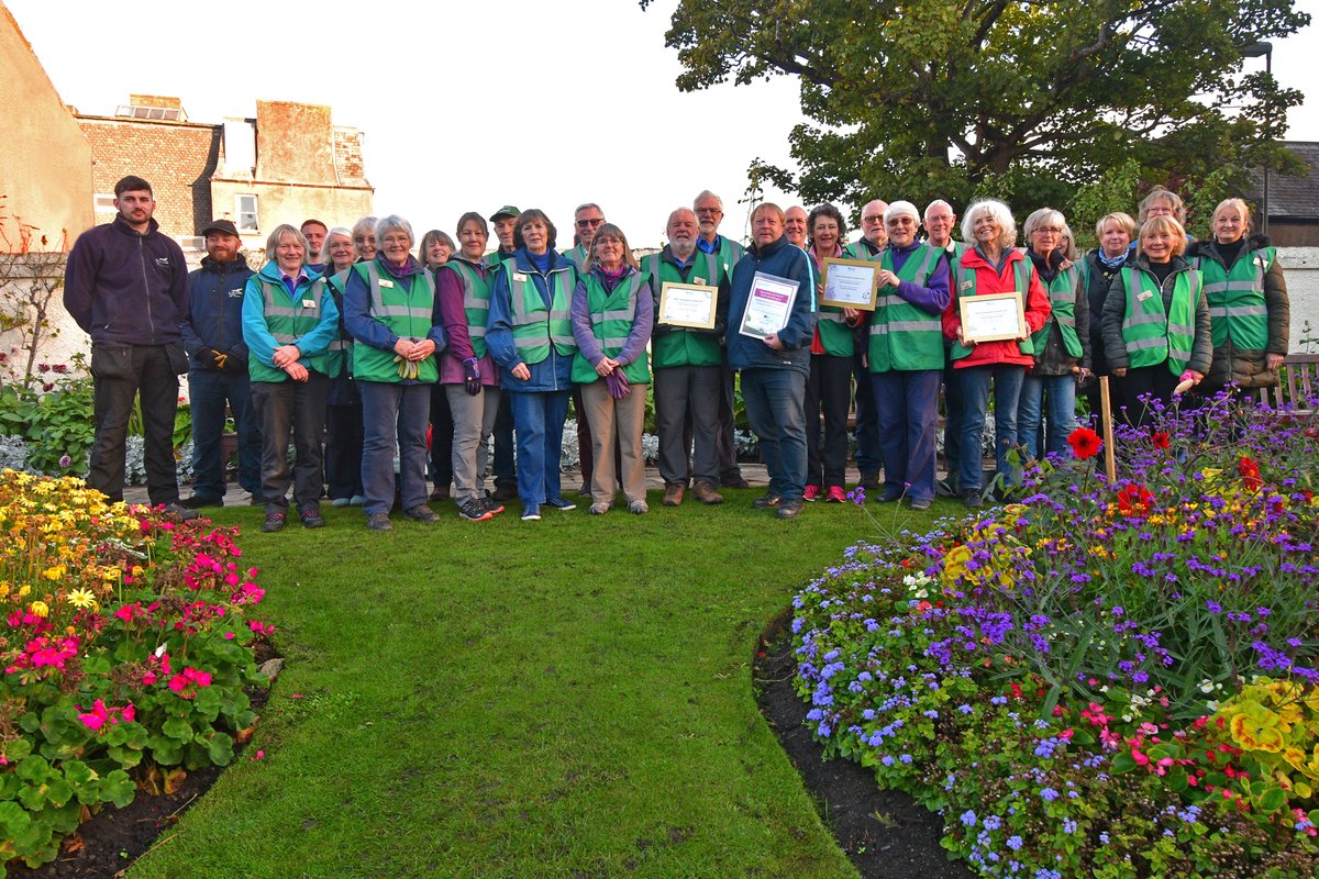 Some of the 40 volunteers and our ELC colleagues  with the 2021 Beautiful Scotland gold and other awards. Thanks Ian Goodall for the  photo. @eastlothiancouncil  #ourbloom #northberwick @KSBScotland