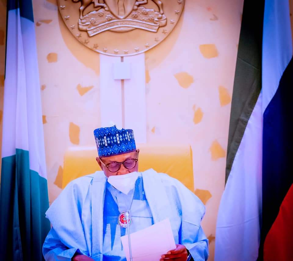 HotnewsN's tweet photo. Security Council 10: President Buhari with Vice President Prof. Yemi Osinbajo while decorating Col. YM Dodo (Aide de Camp to the President) to his new rank of Colonel shortly before presiding over Security Council Meeting in State House on 25th Nov 2021. With them is his wife. https://t.co/iibe8IQi0n