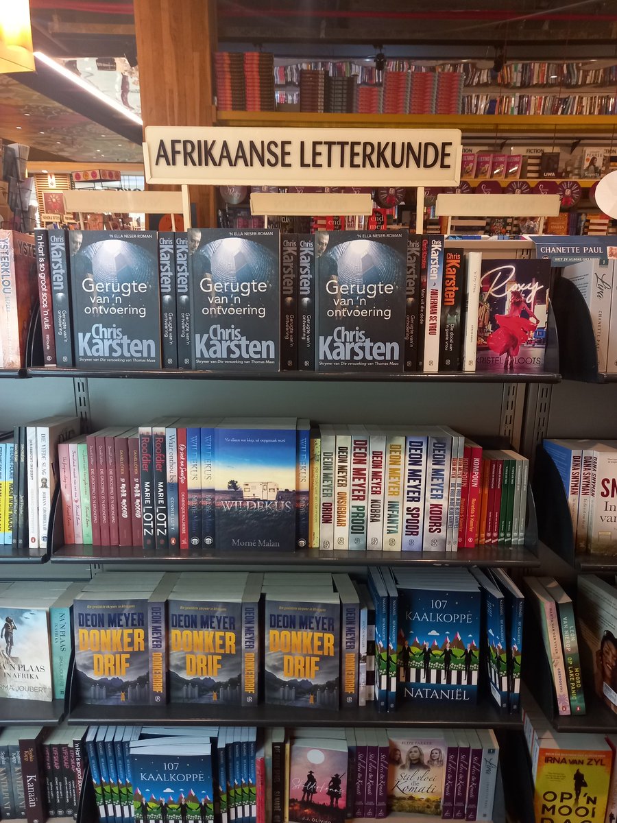 garland_shelley's tweet photo. I can't be the only one that finds the Afrikaans section in bookshops triggering? If @ExclusiveBooks must have it, can't it be behind a curtain or something so we don't have to see it? https://t.co/VUGVBhxPwX