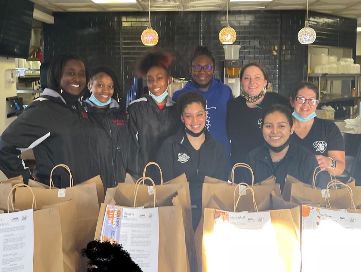PageHSCheer's tweet photo. This morning we had the pleasure of filling bags with Thanksgiving meals for Genesis Child Development with Jakeβs Diner and AWOL Outreach #givingback #PHSCheer https://t.co/KJxAQtO59I