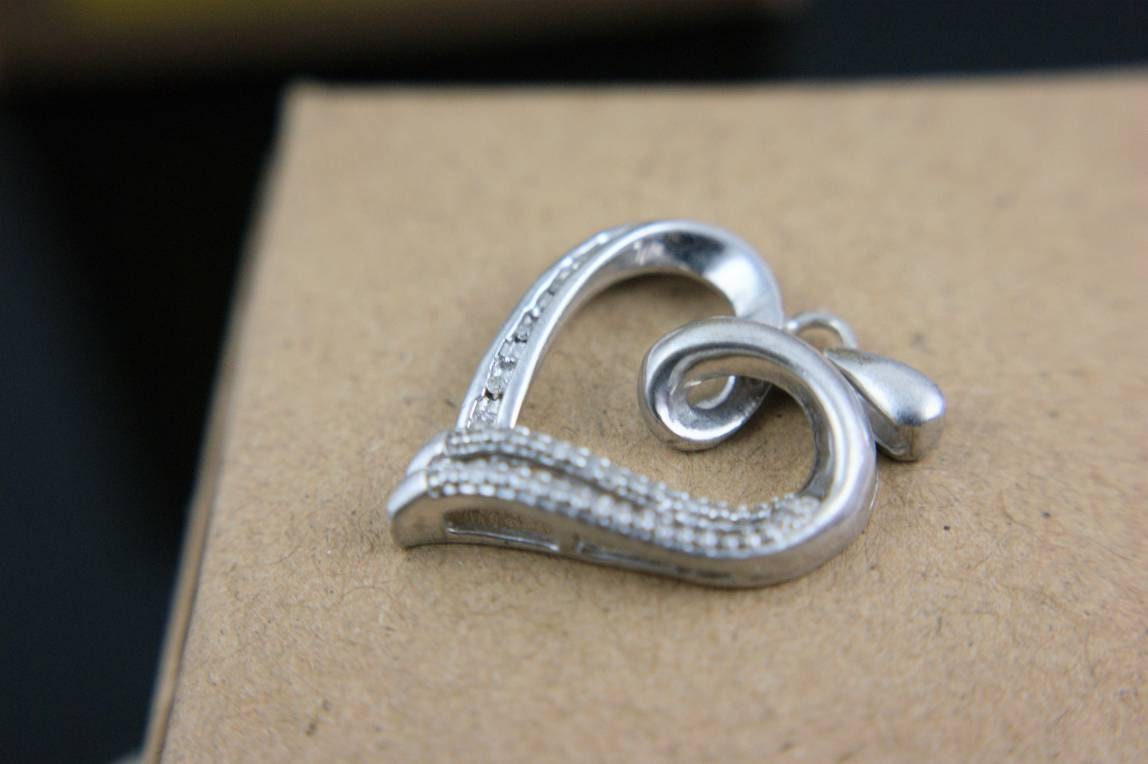 ProfHeritage's tweet photo. Beautiful Heart Pendant, Encrusted with CZ crystals to add that bit of sparkle https://t.co/q4j2P8fiI3