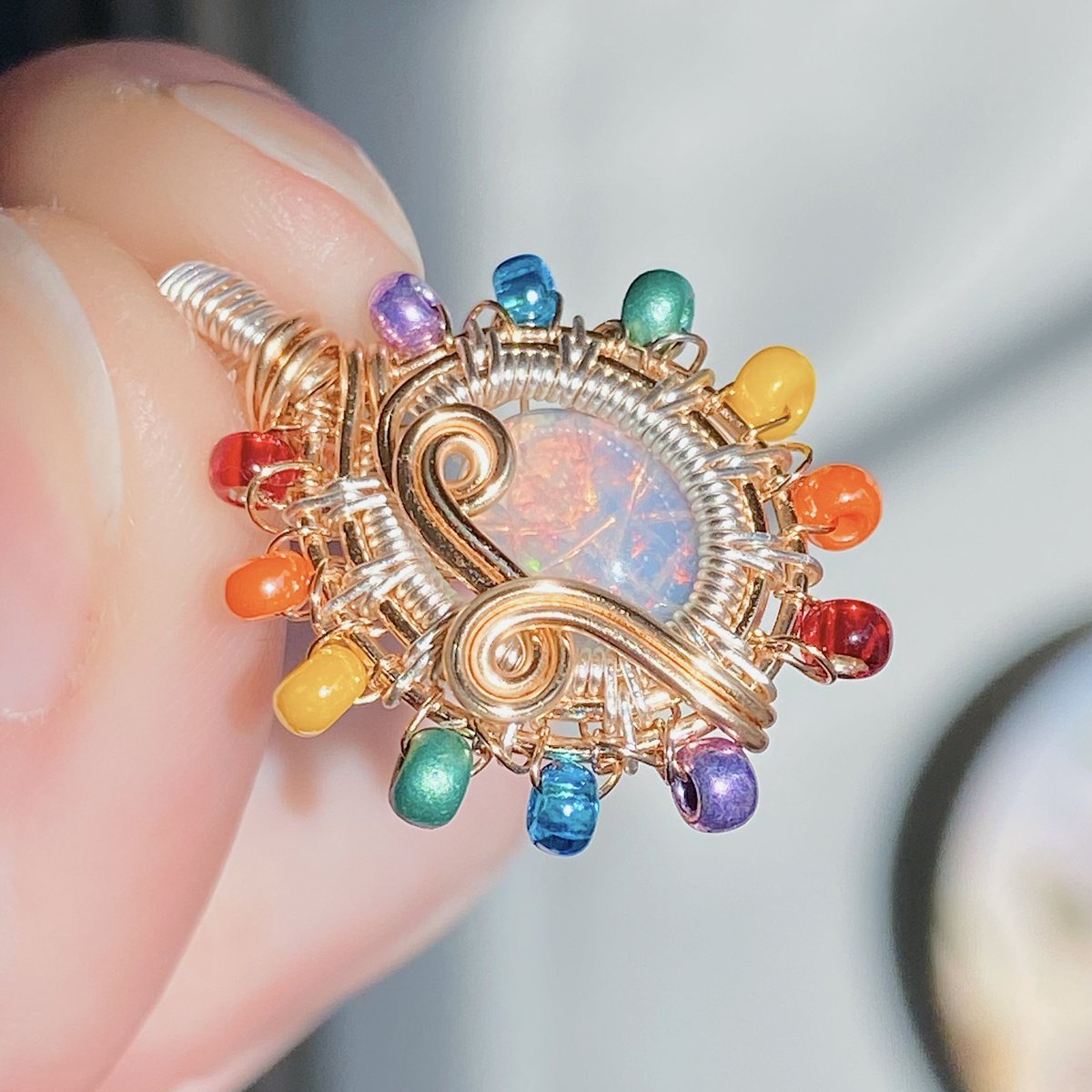 tayraegems's tweet photo. here she is! the new &amp; improved rainbow opal pendant!!!🌈💫 https://t.co/Vjy0ce8GYk
