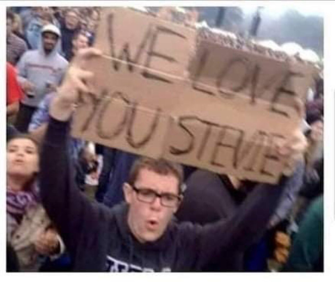 This guy brought a sign to a Stevie Wonder concert