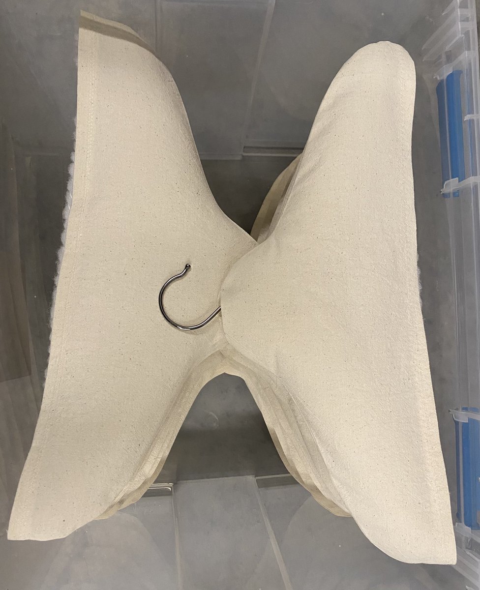 ericavanbosch's tweet photo. Spot the difference! 👁 Uniforms in the artifact collections are getting custom-made padded hangers. Thanks to Sue for sewing and Loren for hanging! 🧵🪡 There is so much work that goes on behind the scenes with @SciTechPreserv. This is just one example. https://t.co/SyilgK89hr