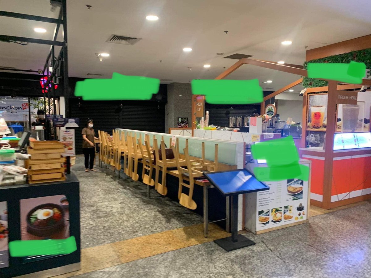 LeongWaiKitCNA's tweet photo. A day after 2 anti #Myanmar army protesters were reportedly punched by security guards in Myanmar Plaza, people boycotted the mall 

I edited the photos from @Khithitofficial to mask the merchants — my intention is to show emptiness https://t.co/A7CgsraHCr