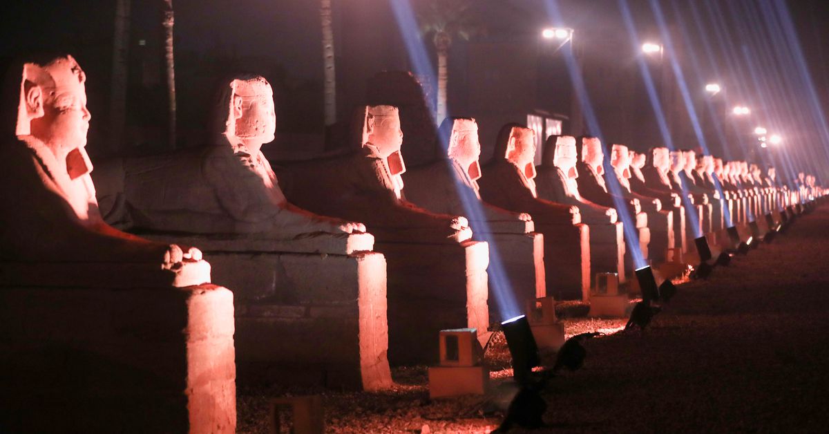 Reuters's tweet photo. Egypt revives ancient road connecting Luxor and Karnak https://t.co/ZEq9kZQMSt https://t.co/qmqdeGyXGq