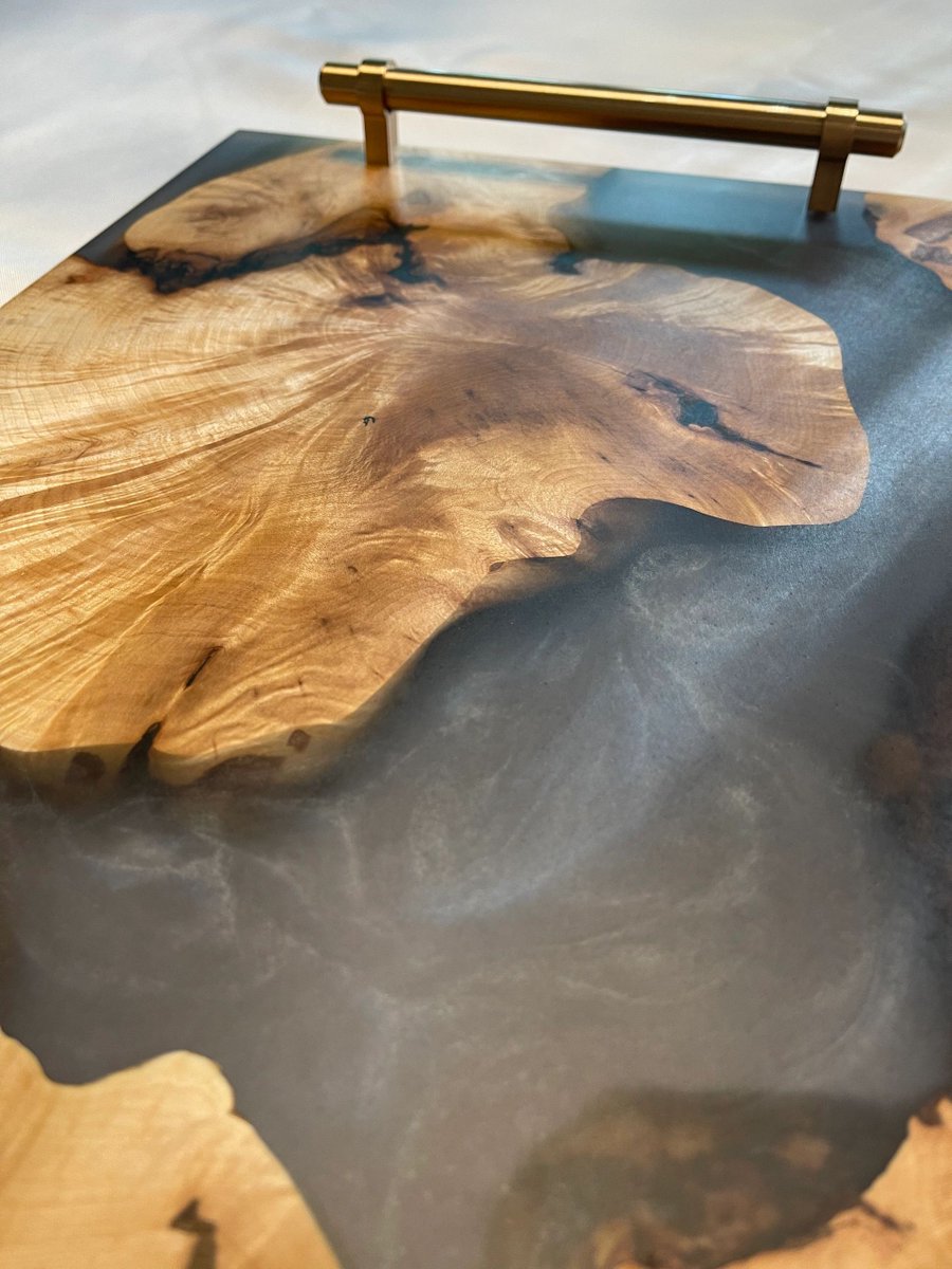 TODDULRICH's tweet photo. Maple Burl with translucent Charcoal Charcuterie Board by UlrichDesign Co. https://t.co/UZOXzMoyTc