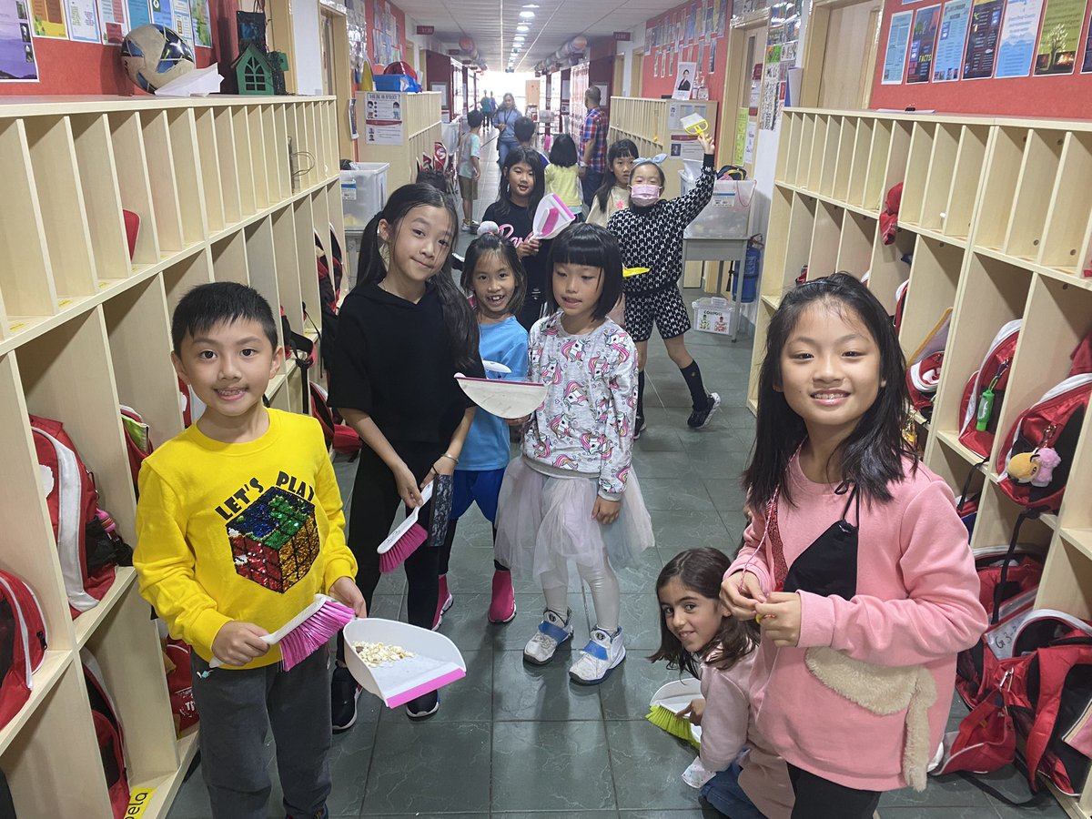 Feeling proud of simple actions! One student noticed a problem and 3-2 jumped to action cleaning up spilled popcorn in our hallway to help our cleaners. “This hallway is our responsibility!” #TISmacao #responsibility #tigertraits