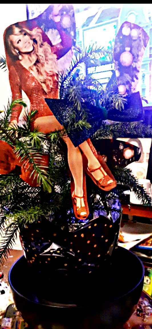 wneely88's tweet photo. So, fun fact @MariahCarey, at 33, I've never had a tree that didn't have to be assembled! It may be $5 but it counts! lol. Until I get your official ornament, I had to improvise. What do you think? https://t.co/0Oh8ZuyIcc