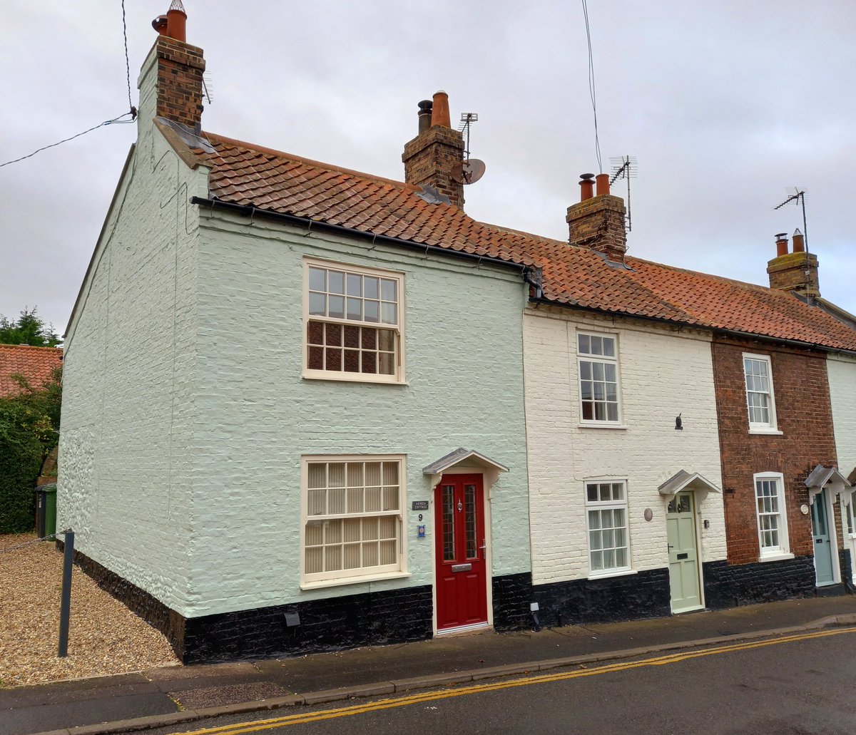 Colourful cottages in Wells next the Sea, Norfolk. Clay pan tiled roofs and sash windows. What is not to like?