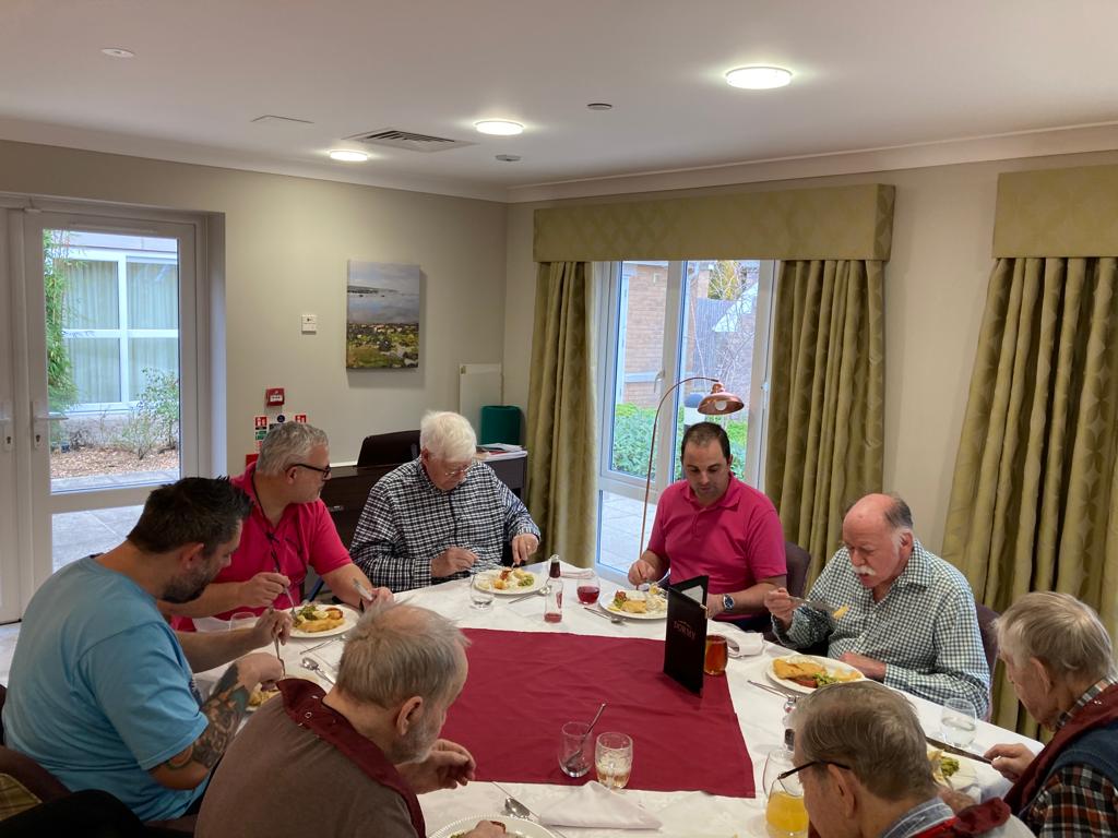 PineMartinCare's tweet photo. It was 'National Men's Day' last week and lots of our gentlemen sat down for a celebratory lunch! Residents were joined by staff members for a fish and chip dinner, a few beers and lots of laughs! #nationalmensday https://t.co/5MWY7EZ9uM