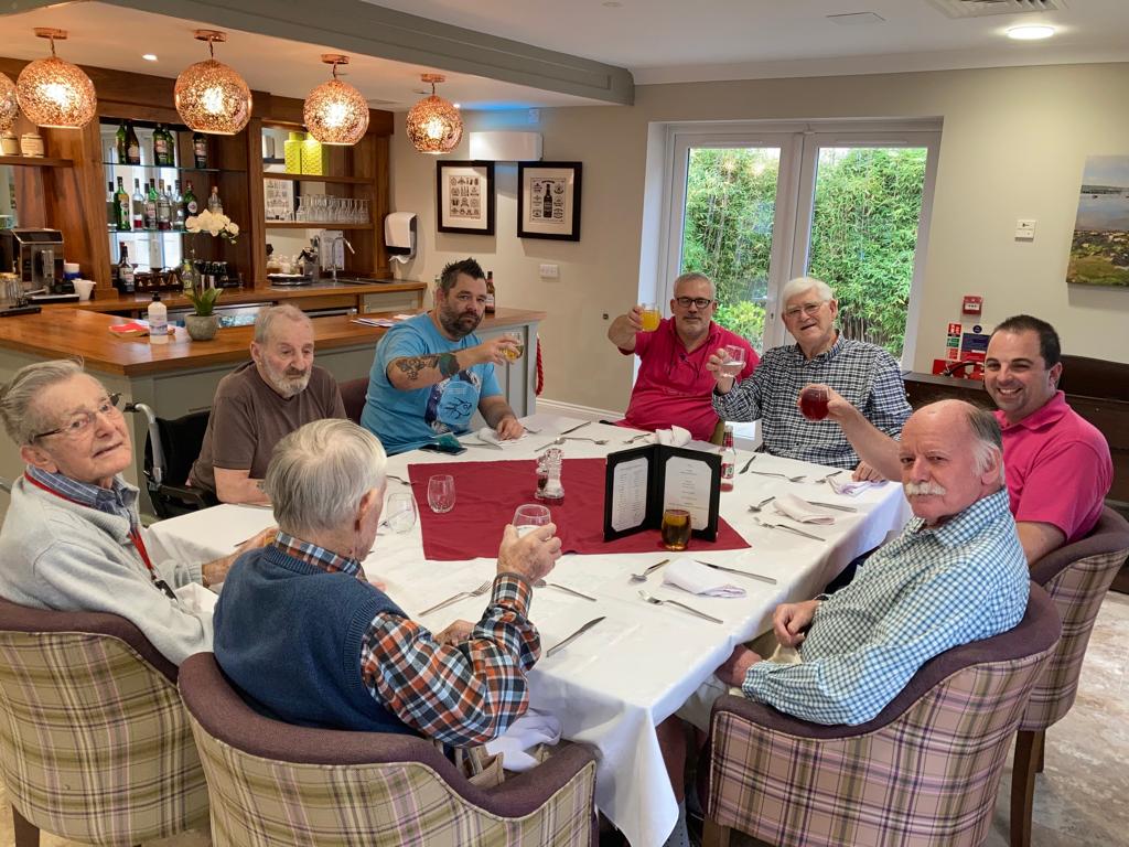 PineMartinCare's tweet photo. It was 'National Men's Day' last week and lots of our gentlemen sat down for a celebratory lunch! Residents were joined by staff members for a fish and chip dinner, a few beers and lots of laughs! #nationalmensday https://t.co/5MWY7EZ9uM
