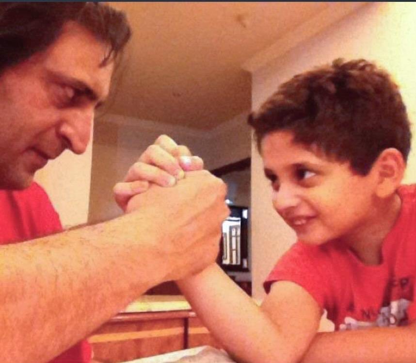sajadlone's tweet photo. From the Archives. Me and my son arm wrestling. This is I think is 10 years old photo. Mashallah Emad is a big boy now. But memories. And how fast kids grow. How fast life moves on. How transient it is. https://t.co/4CBL39x6Cc