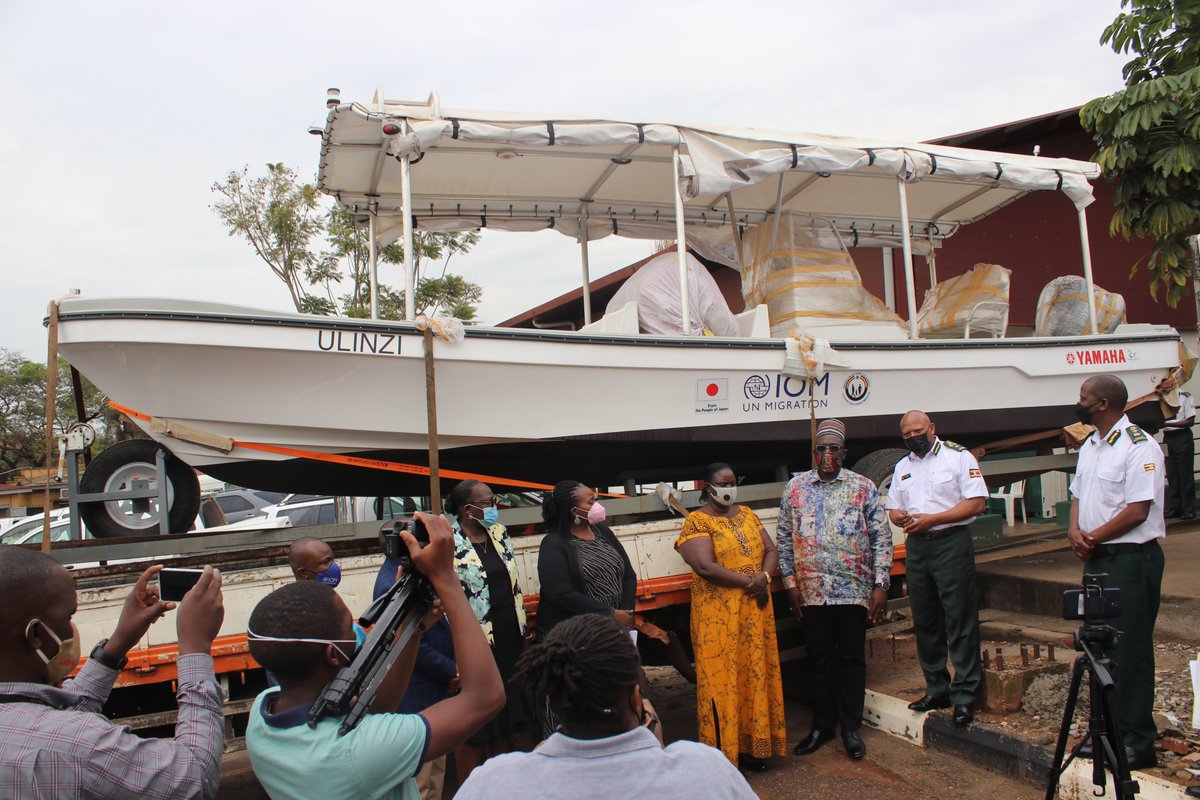 IOM_Uganda's tweet photo. @IOM_Uganda Chief of Mission @Sanusi has handed over a patrol-and-rescue boat &amp; personal protective equipment (PPEs) to @DCICUg in @MIA_UG .  Worth $115,000 (UGX 408M), the donation was funded by @JapanGov to boost Uganda's maritime border management. @JapanEmb_Uganda @AbdikerM https://t.co/7ddqmNUmie