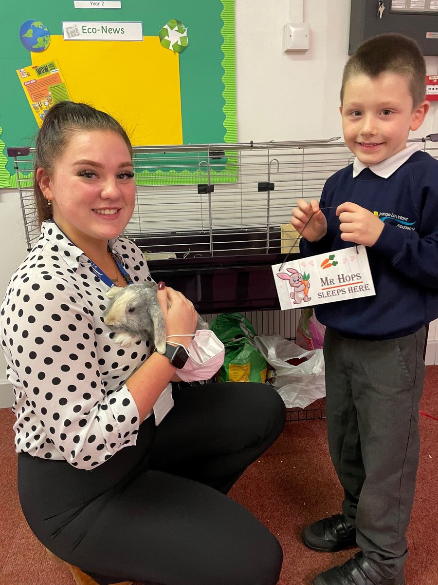 DeltaGrangeLane's tweet photo. Mr Hops is official! As Harley came up with the name we had him come to the office to put Mr Hops' name sign on his house. Mr Hops loves his name! #MrHops #GLIARabbit #SchoolPet https://t.co/p30grAM5MQ