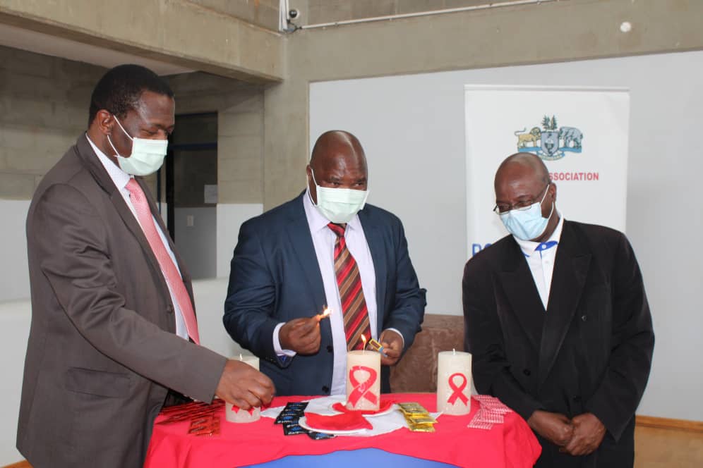 EswatiniGovern1's tweet photo. [PHOTOS]: Minister of Public Service Mabulala Maseko leads a candlelight  ceremony as a build up to World AIDS Day to be observed globally on 1 December 2021. The event was held at the Eswatini Institute of Management &amp; Public Administration (SIMPA) today.
#EndAIDSTogether https://t.co/B6WXT0A72m