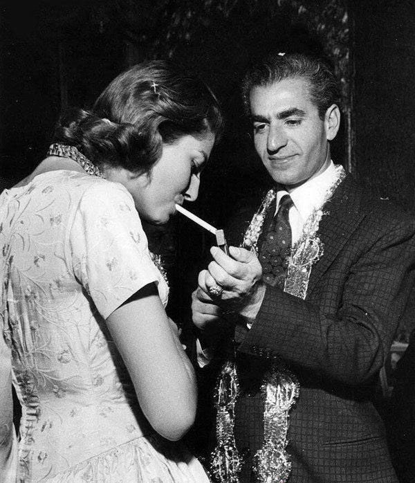 I was doing research and I found a photo of the former shah oh Iran lighting up a cigarette for “his queen”. It made me think of #masculinity and #femininity in #modern #iran. Anybody interested to discuss this? #IranianStudies #queerstudies #pahlavistudies @AIS_1967