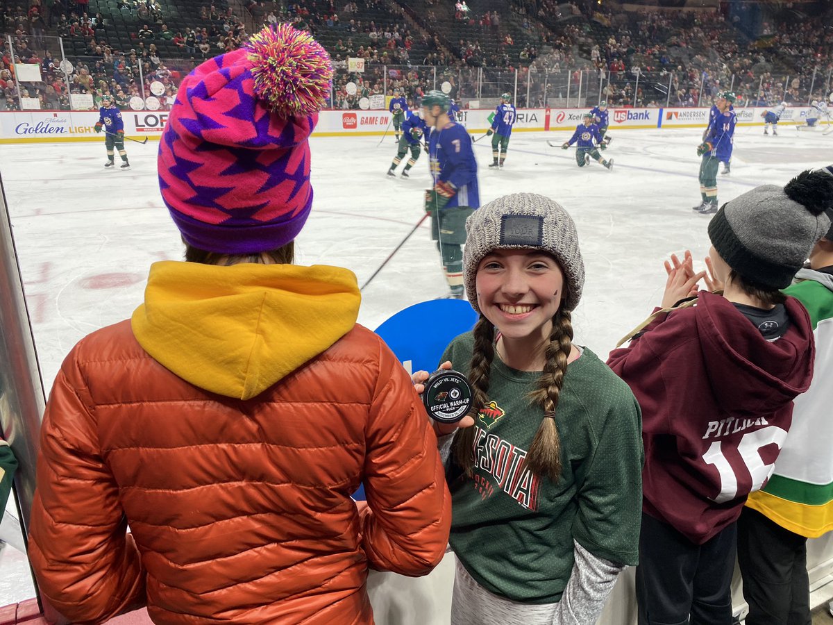 First MN Wild game and she got a puck!! Thanks @NBjugstad72!! #mnwild