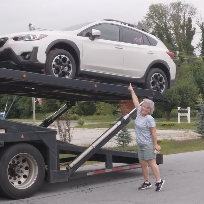 AutoNation's tweet photo. Can we get an OH YEAH for Rita?! She purchased her first new car and got it delivered right to her door. Cheers to her never give up attitude! #OHYEAH #DRVPNK #AutoNationDelivers #StoreToDoor https://t.co/uMTPobMIuQ