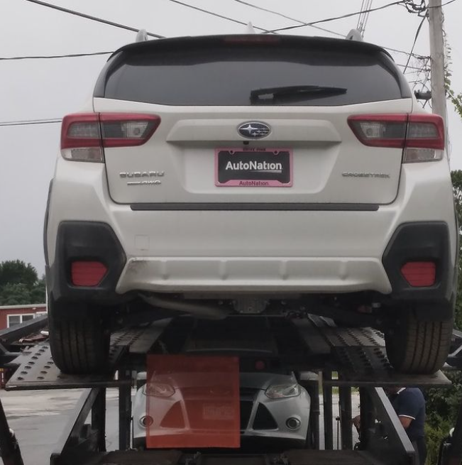 AutoNation's tweet photo. Can we get an OH YEAH for Rita?! She purchased her first new car and got it delivered right to her door. Cheers to her never give up attitude! #OHYEAH #DRVPNK #AutoNationDelivers #StoreToDoor https://t.co/uMTPobMIuQ