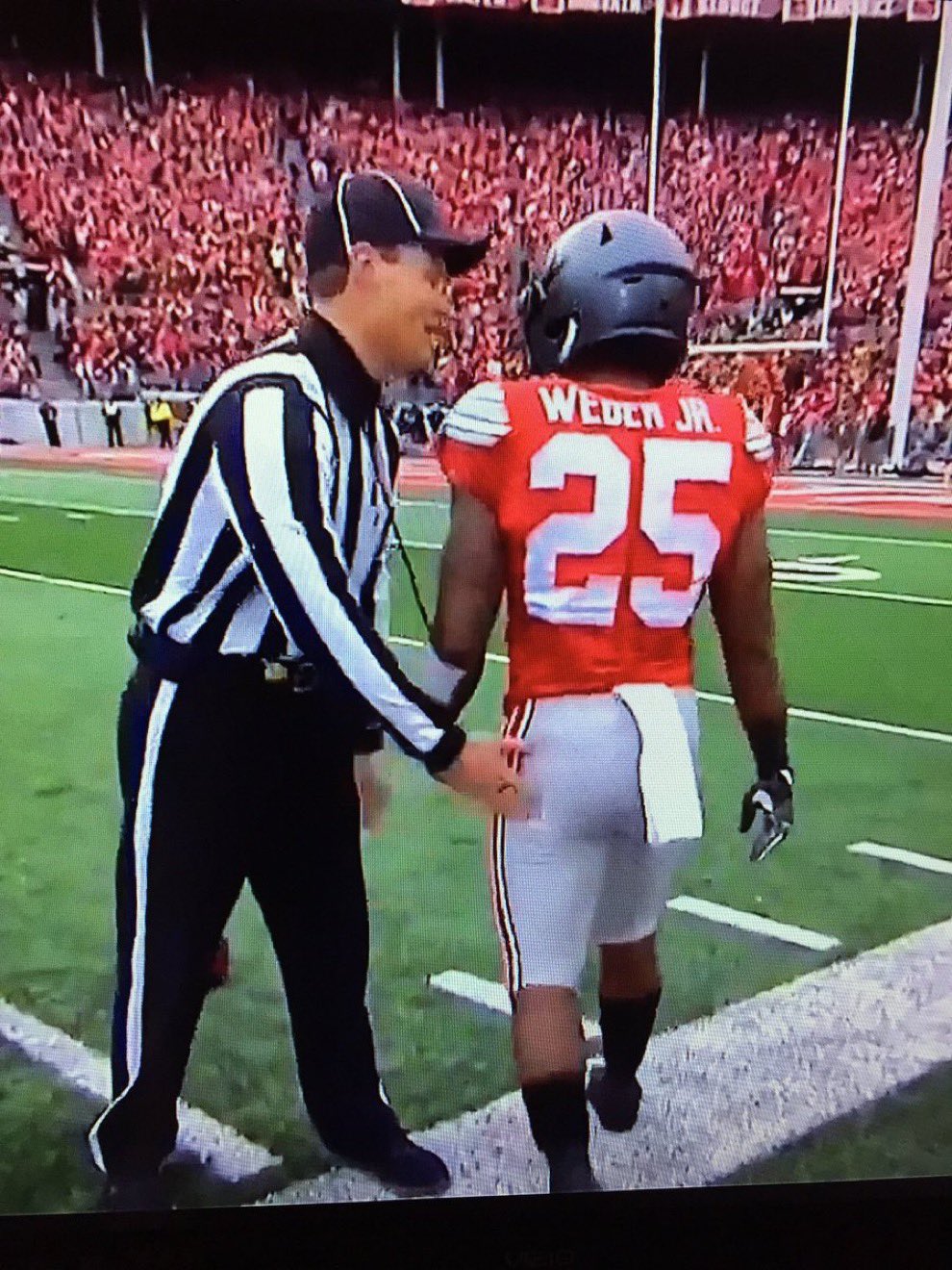 HUGE on X: "This is the Ohio State fanboy ref working the Ohio State at  Michigan football game Saturday in Ann Arbor. Love the photo from his  unbiased work in that classic