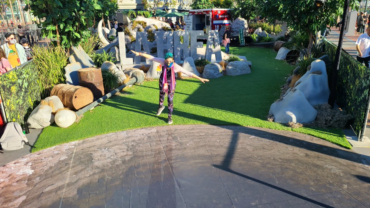 FAN_VERSATION's tweet photo. We survived the #LaBreaNBC #DownBelow sinkhole! Fun photo spots and giveaways (while supplies last) 🤩 They also have a water filling station. You can check out the #LaBrea experience near #TinFish Saturday 9a-6p and Sunday 9a-4p at #CCSE21! #CCSE #ComicCon https://t.co/AITrZz69LP