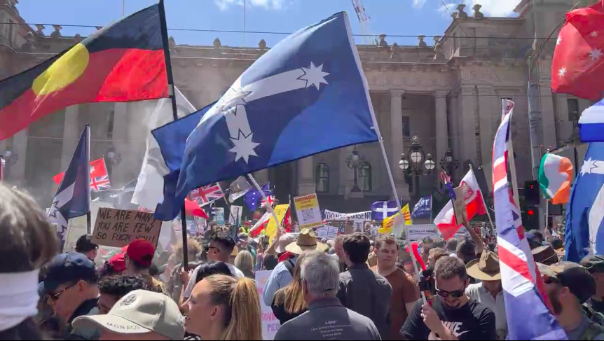 BethanyCherisse's tweet photo. Melbourne CBD.
Parliament House.
11.45am, Nov 26th 2021.
Week 5 of non-stop protests.
Fifteen minutes till official rally start time - the streets are filling quickly.
#NoVaccinePassportsAnywhere
#ReclaimTheLine
#OccupySpringSt
#SomyurekTheBill
#KillTheBill
#SackDanAndrews https://t.co/oGwquTUigz