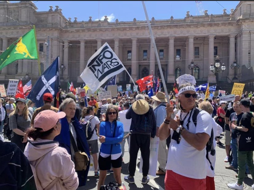itsdaveoneil's tweet photo. This is a photo from today’s protest in Melb, and an info wars flag! Any decent person should see that flag and go home. It’s the company you keep that defines you... https://t.co/t24InlpOM9