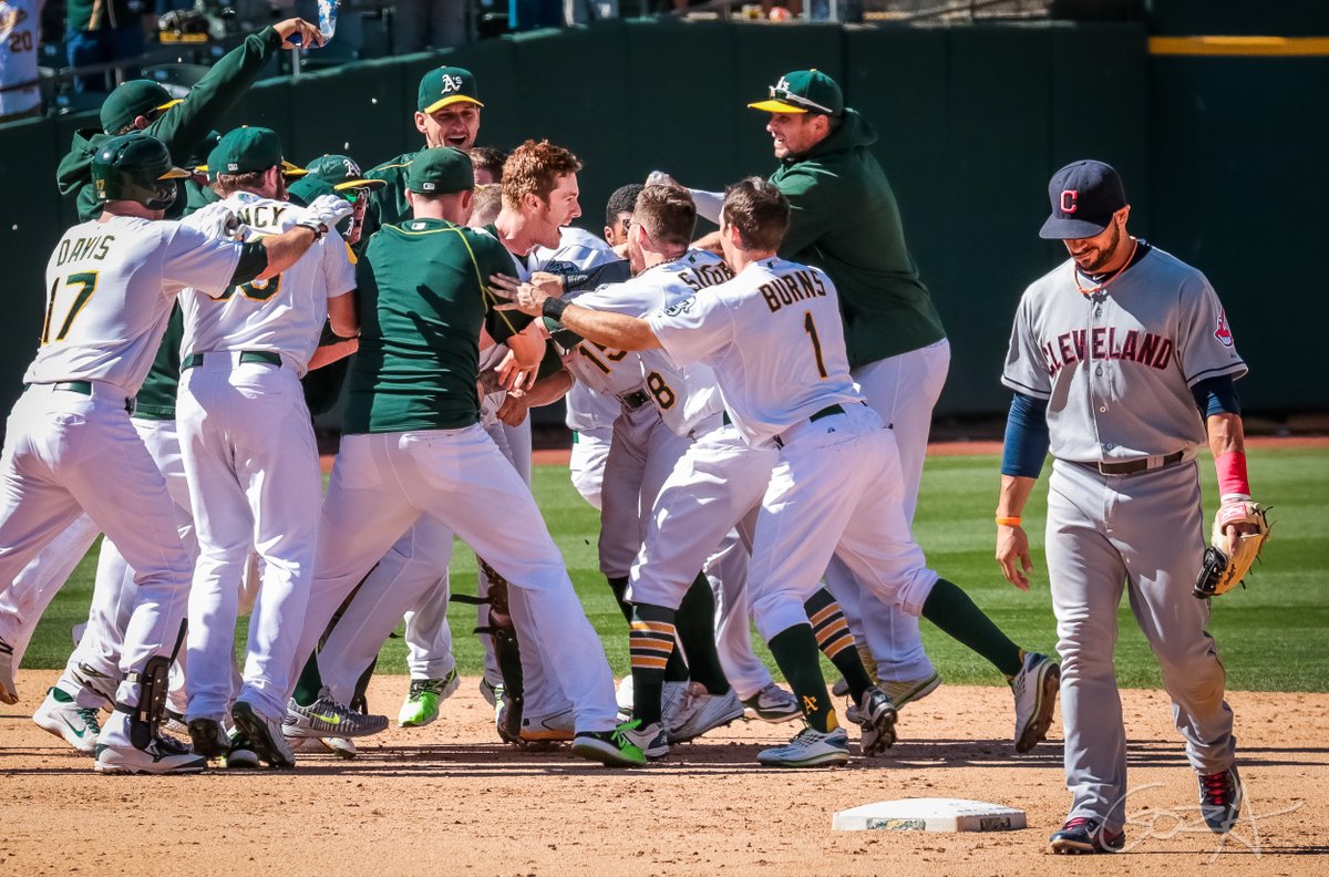 RossGoza's tweet photo. Mark Canha's first walk-off hit for the A's in 2015. The Mets and their fans (and NYC restaurants) are gonna love him. https://t.co/E3qmEWzkJi