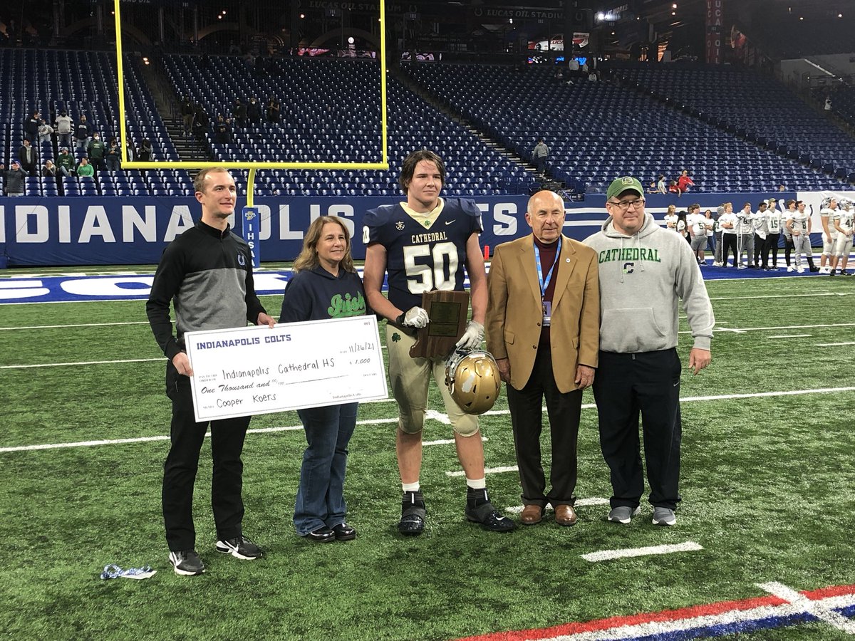 IHSAA1's tweet photo. Cathedral’s Cooper Koers earned the Phil N. Eskew Mental Attitude Award in 5A Football presented by the Indianapolis ⁦@Colts⁩! 
🏆🏈🎓🔵🟡 ⁦@gochsathletics⁩ #IHSAA https://t.co/YFnhPwvx8x