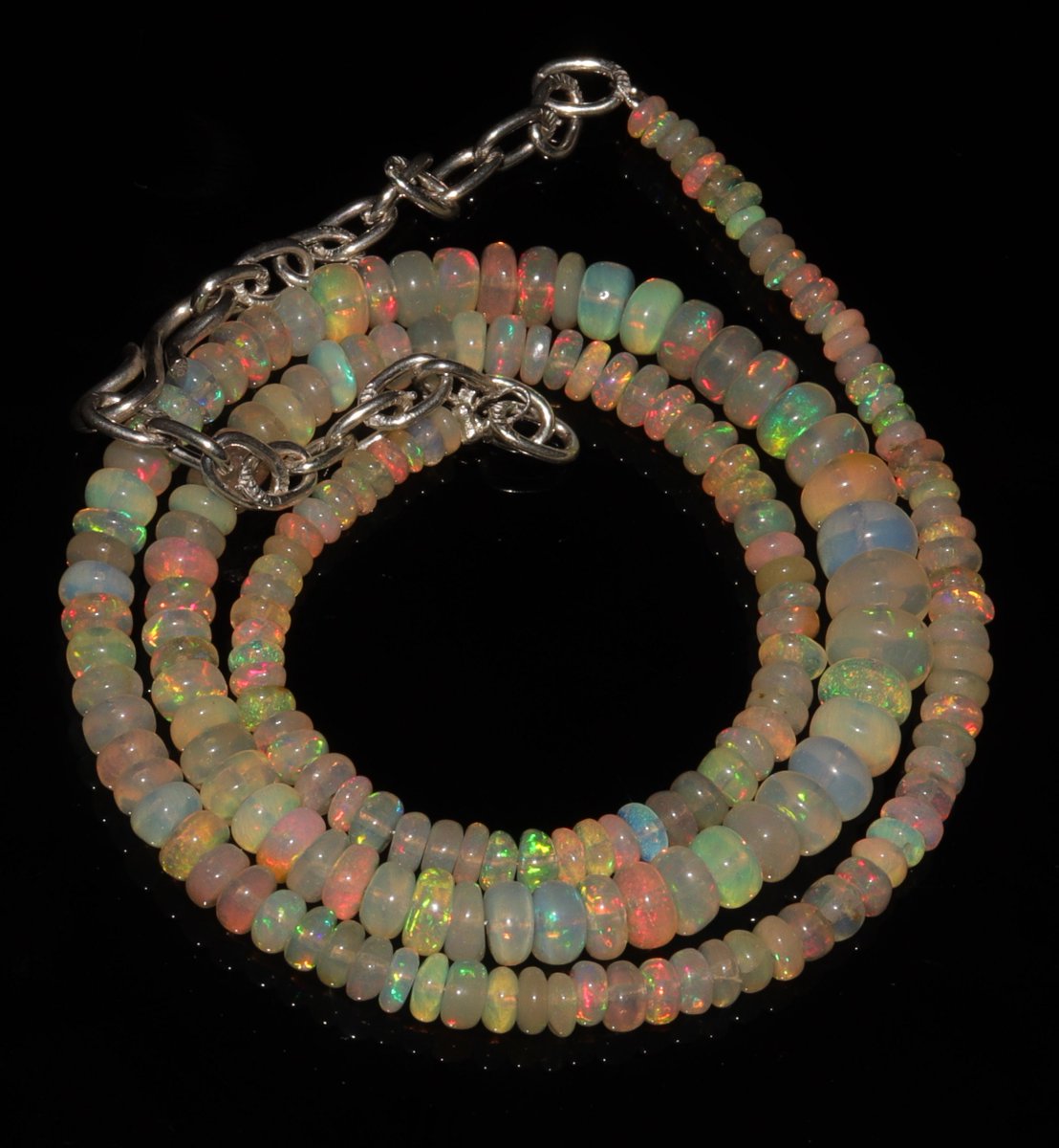 Thanks for the kind words! ★★★★★ "I wore it in the sun and the colors are beautiful. Thank you." Deborah C. etsy.me/3CR1naM #etsy #anniversary #rondelle #luck #yes #opal #unisexadults #gemstone #ethiopianopalbeads #opaljewelry
