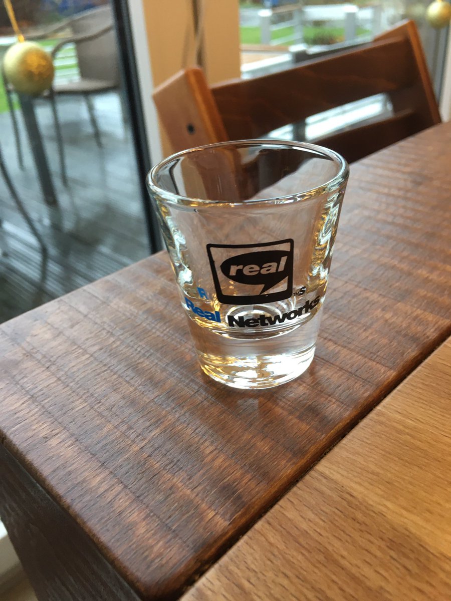 basis42's tweet photo. Gerade bei Küchenschrank aufräumen gefunden: Das @RealNetworks Schnapsglas … das waren noch Zeiten … einmal durchgewaschen und ab damit, wieder in den Schrank für die nächsten 10 Jahre 😊. https://t.co/VbD7ExVCnm