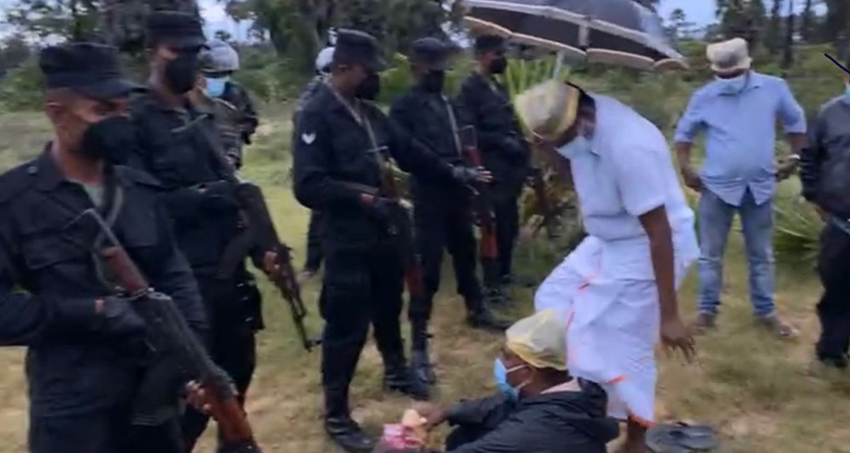 backtoeelamm's tweet photo. the resistance of our people is unmatched as they face intimidation while remembering their loved ones at a thuyilum illam https://t.co/HlwIbaAVlO