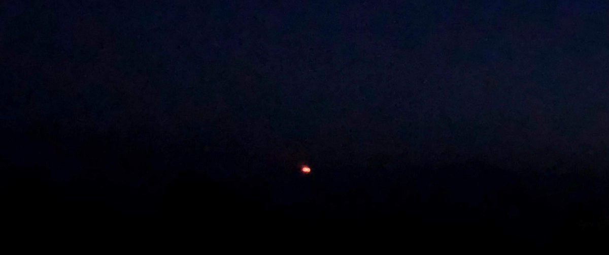 ChinHumanRights's tweet photo. Thantlang is still burning as the junta sets fire to more houses tonight. The inferno can be seen from more than 30 miles away from India's Mizoram State. Patterns from recent fires indicate soldiers are targeting remaining the buildings which obscure the views from their 2 camps https://t.co/Tb4gNYX2bR