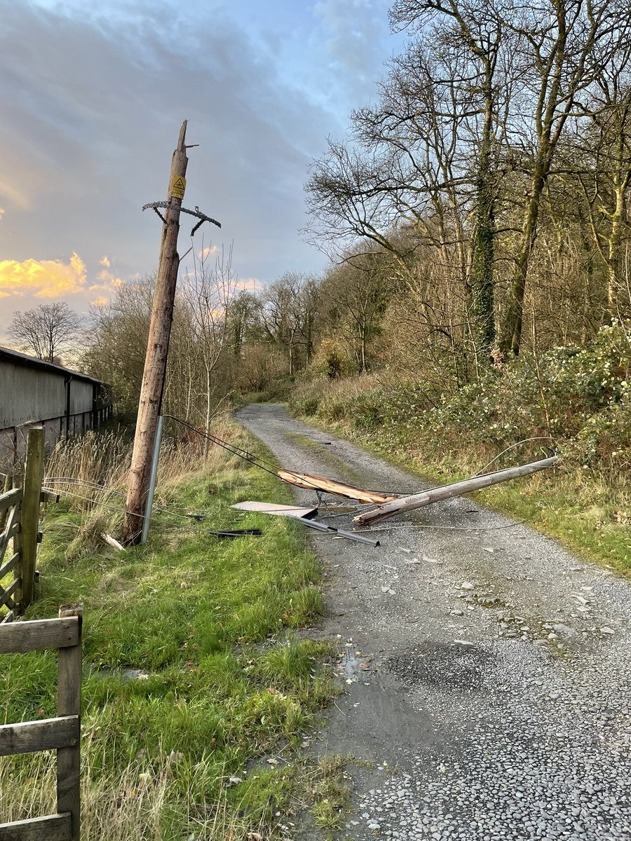 sirobot1's tweet photo. After #StormArwen we are still without electricity and unable to leave home. Cables down and now hanging dangerously low over the A595. @ElectricityNW are still not answering my calls 🙁 https://t.co/t1qmHes5u9