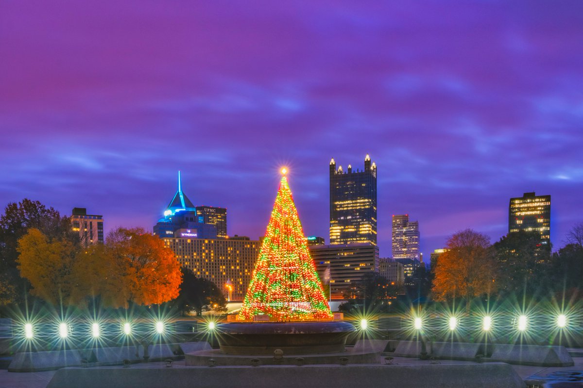 DaveDiCello's tweet photo. The way the Christmas tree at the Point in #Pittsburgh seems to becomes part of the skyline is one of my favorite compositions around the holidays. Last week colorful clouds rushed over the city before sunrise, creating the perfect backdrop for the entire scene. https://t.co/RaH6Wv5UnH