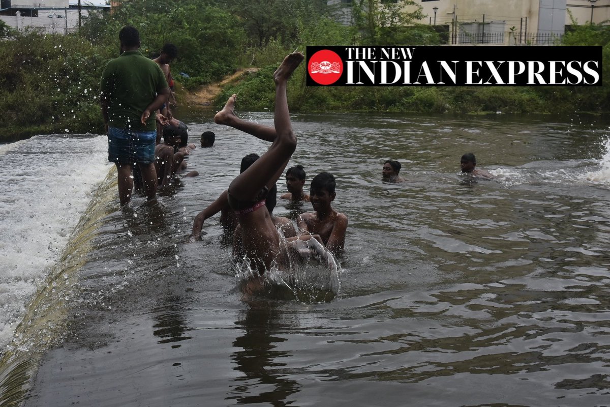 Jawahar_TNIE's tweet photo. Local children enjoy at ayyappakkam lake while it is draining following consistent rains @shibasahu2012 @xpresstn @NewIndianXpress https://t.co/7ZS0rJ5Pwb