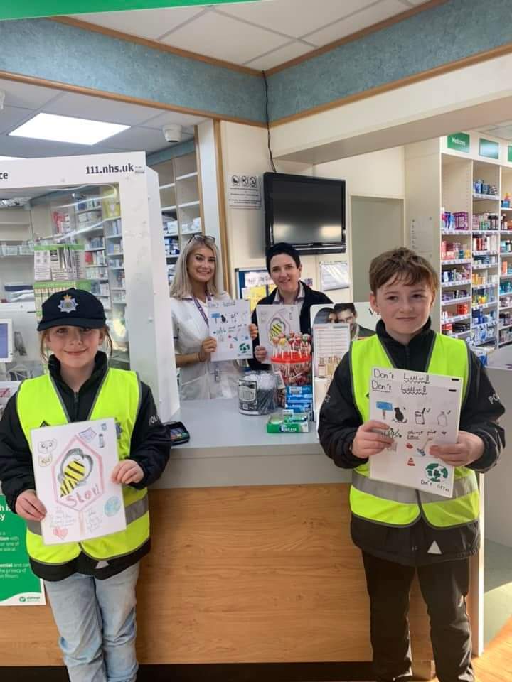 MissCorlessY6's tweet photo. Well done to our two superstar competition winners who now have their posters displayed in local shops and businesses. Thank you for displaying them for us! @MinipoliceR #stoplittering #saveourplanet #lookafterourcommunity https://t.co/GzuuWHC3op